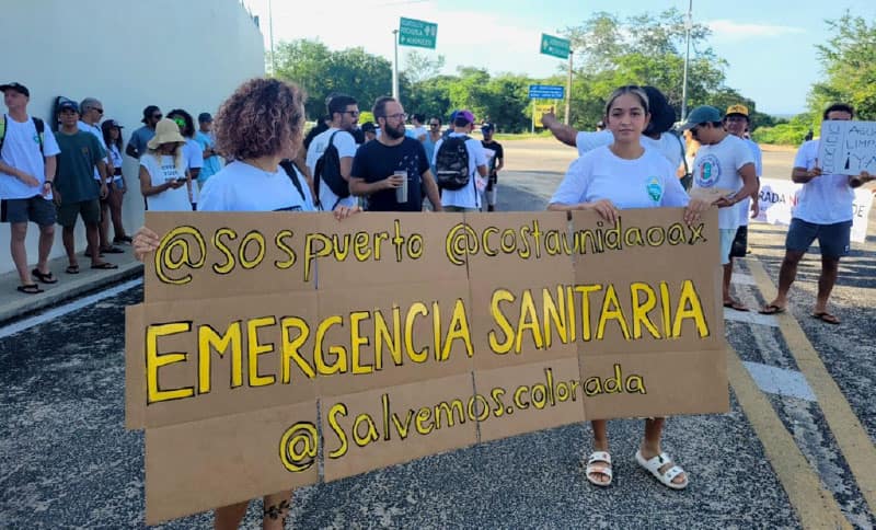'Health emergency' reads the banner held by protesters on Wednesday.